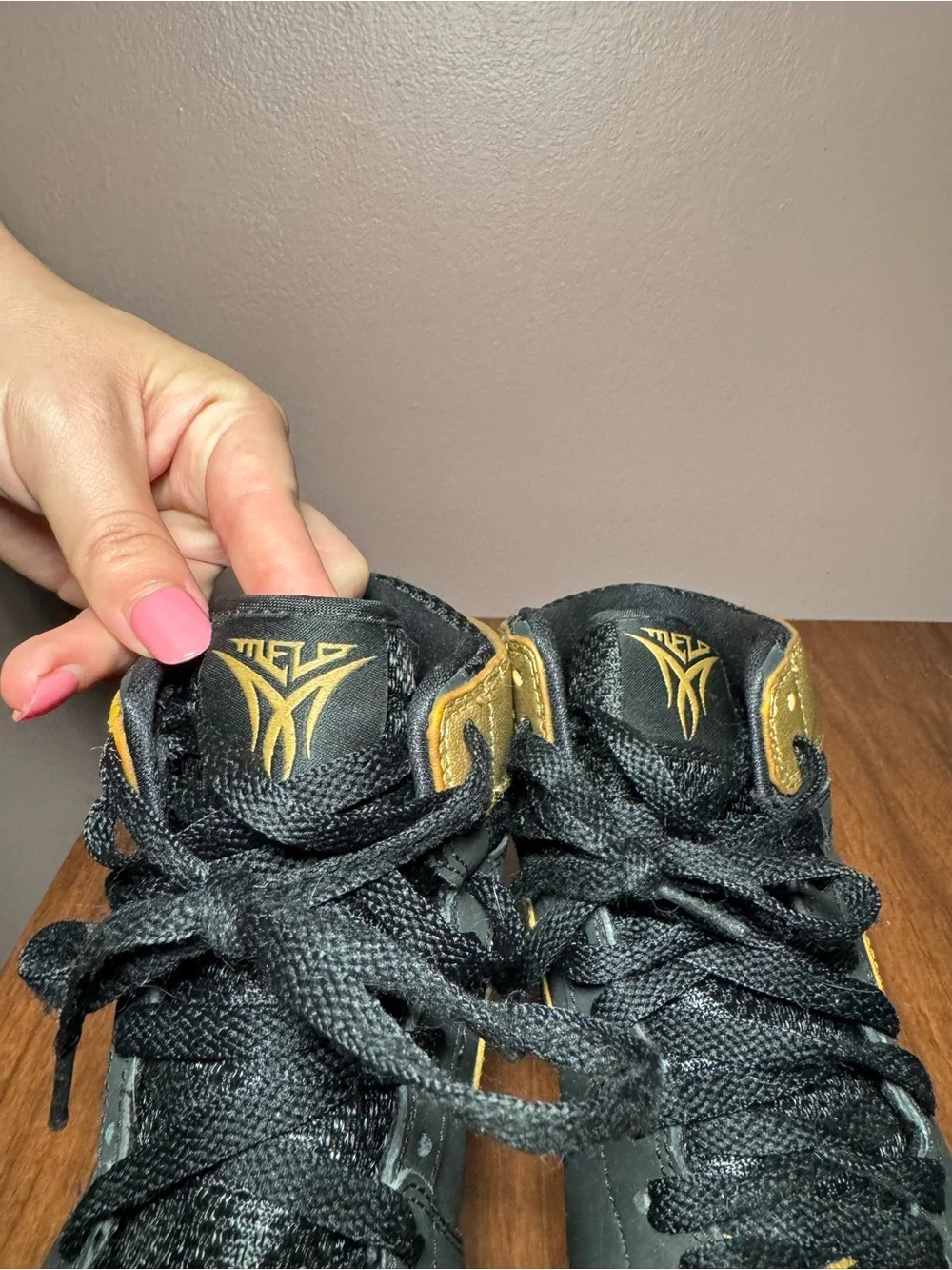 Air Jordan Melo Unisex Youth Mid Top Leather Basketball Sneakers Gold/Black 5.5